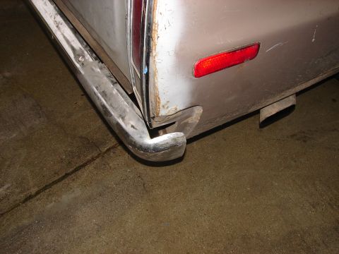 1973 Ford Ranchero - Rear view of a 1973 Ford Ranchero, showing the bumper, tail light, and exhaust.