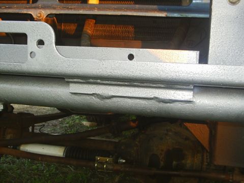 1984 Ford Bronco - Close-up of the front brush guard and radiator assembly on a 1984 Ford Bronco.