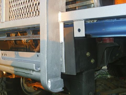 1984 Ford Bronco - Brush guard mounting hardware attached to vehicle frame.