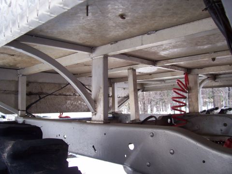 1978 Ford F-150 - The underside of a truck shows custom metalwork and a red coil spring, with a "Supermotors.net" watermark visible.