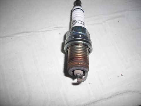 1991 Ford Bronco - Spark plug Audi and Volkswagen logos, likely for a German vehicle.