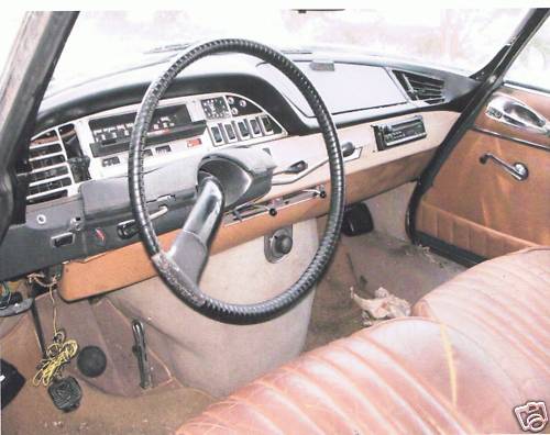 Citroen DS interior with single-spoke steering wheel and brown dash