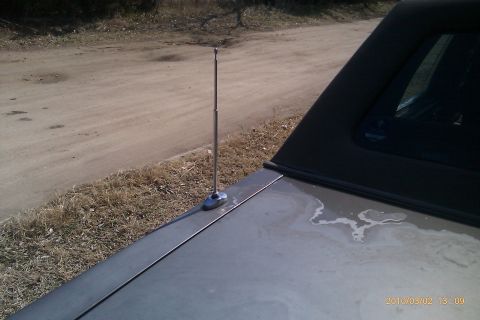 2000 Mercury Grand Marquis - Close-up of a retractable antenna on the trunk of a 2000 Mercury Grand Marquis.
