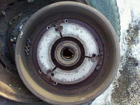 1985 Ford F-150 - This is a close-up view of a worn brake drum assembly, showing the internal components and signs of rust.