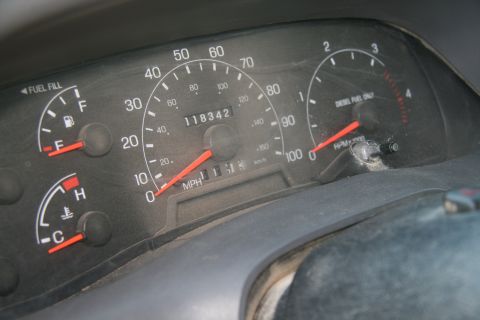 1993 Ford Bronco - The dashboard shows a diesel tachometer and odometer reading 118342, but no specific year is visible.