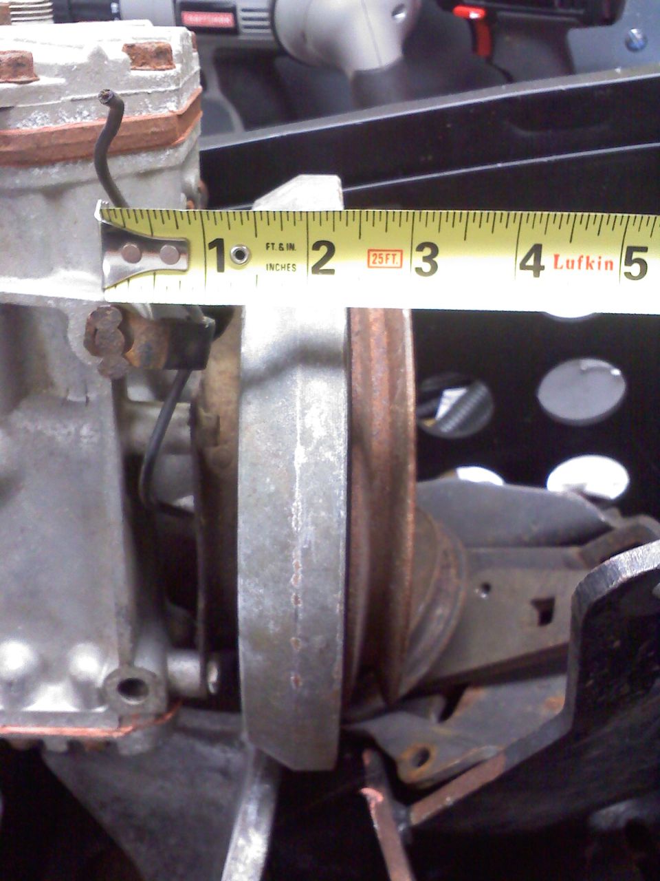 Measuring tape on engine component