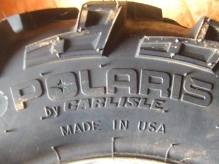 1996 Ford Bronco - Close-up of a tire with brand and manufacturing information visible.