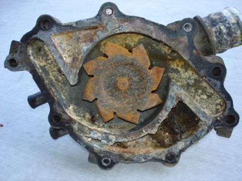 1992 Ford Bronco - This heavily corroded water pump shows significant wear and tear on its impeller.