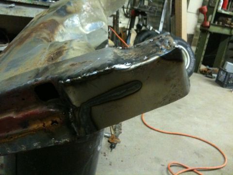 1993 Ford Bronco - This photo shows a section of a vehicle's frame that has been welded, with visible rust and repair work.