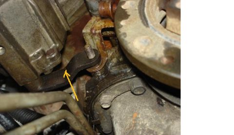 1992 Ford Bronco - A close-up view of an engine part with an orange arrow indicating a specific component.