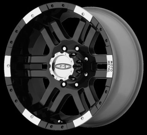 1995 Ford Bronco - A single black and chrome wheel with a multi-spoke design and visible branding is shown against a dark background.