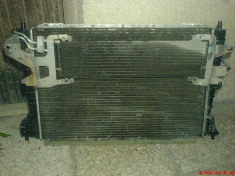 1998 Ford Crown Victoria - Radiator and AC condenser assembly shown before installation or after removal.