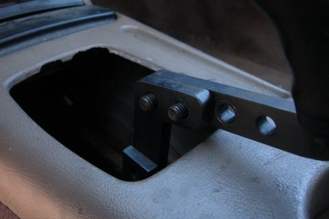 1995 Ford Taurus - Close-up of a modified shifter assembly within a vehicle's interior.