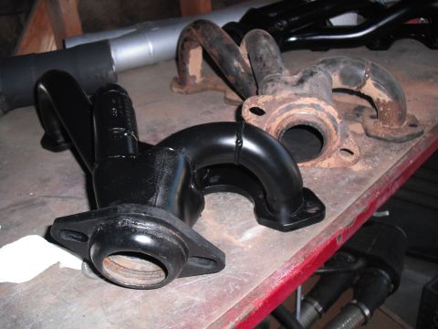 1991 Ford Bronco - A comparison of a used exhaust manifold next to a newly painted one.