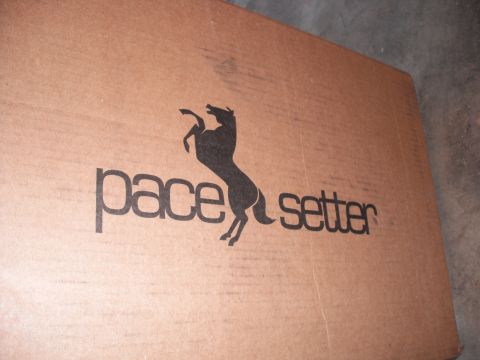 1991 Ford Bronco - Photo of a cardboard box with the Pacesetter logo, not a technical document.