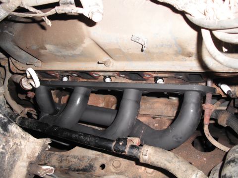 1991 Ford Bronco - Close-up view of a custom exhaust manifold and Y-pipe assembly.