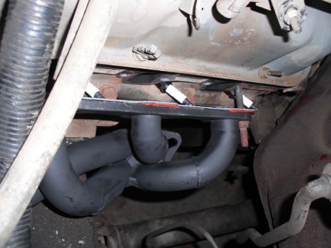 1991 Ford Bronco - Close-up view of an exhaust manifold and y-pipe assembly, likely a replacement part.