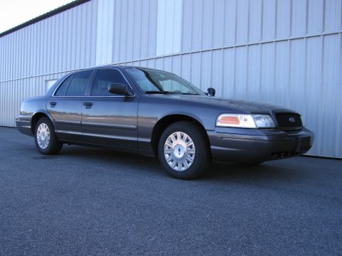 1991 Ford LTD Crown Victoria - This sedan's body style suggests a model year significantly later than 1991.