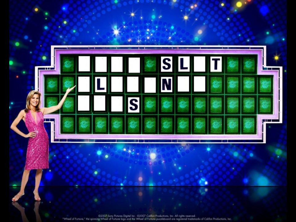 Woman in pink dress points to Wheel of Fortune puzzle board with letters L, S, N, T visible