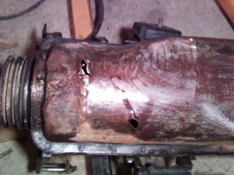 1980 Ford Bronco - Here's where I punched a couple holes in the pan...