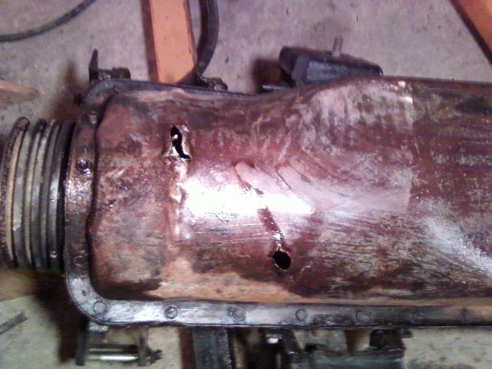 Here's where I punched a couple holes in the pan...