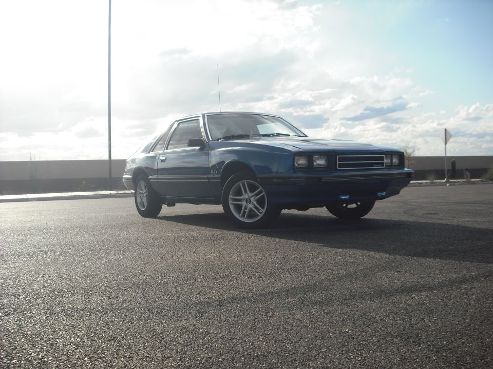 Blue 1983 Mercury Capri 5.0 coupe parked on asphalt