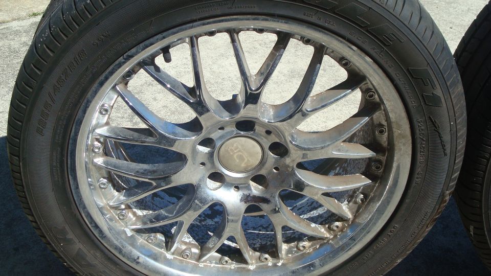 Chrome alloy wheel with tire, showing 'ADR' logo in center cap