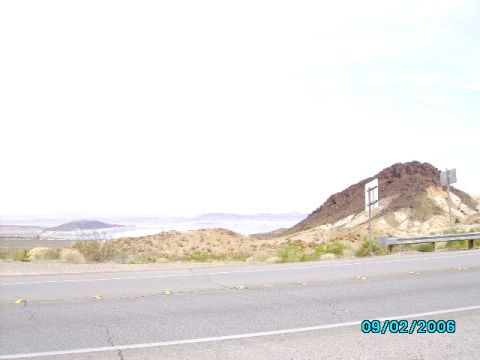 1978 Ford Bronco - A scenic view of a desert landscape with a road in the foreground and mountains in the background, captured on September 2, 2006.