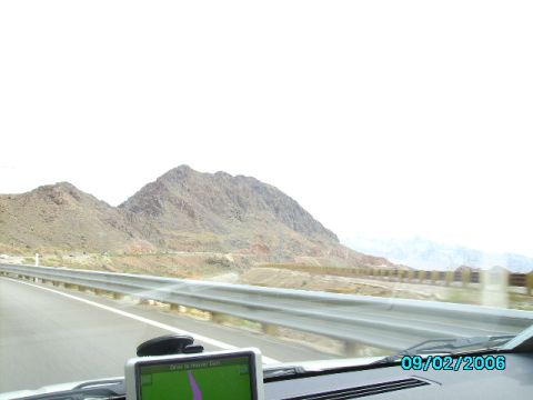 1978 Ford Bronco - A scenic view from a vehicle's dashboard, showing a GPS device and a mountainous landscape.