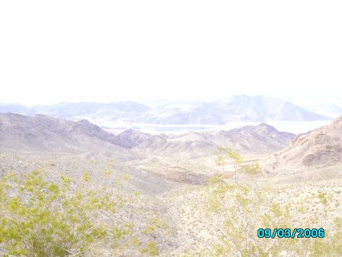 1978 Ford Bronco - A wide shot of a desert scene with mountains and a distant body of water, dated 09/03/2006.