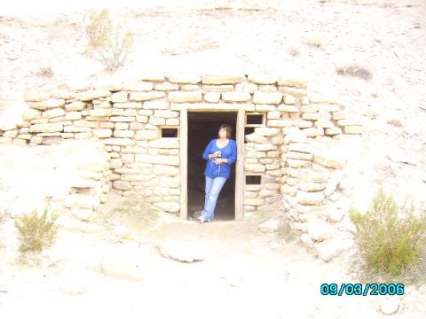 1978 Ford Bronco - A woman stands in the entrance of a stone structure, with a date stamp of 09/03/2006 visible in the lower right corner.