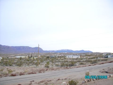 1978 Ford Bronco - Desert scene with mountains and a dirt road, dated 09/03/2006.