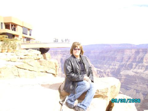 1978 Ford Bronco - A woman poses for a photo at the Grand Canyon, with a date stamp of 09/03/2006 visible.