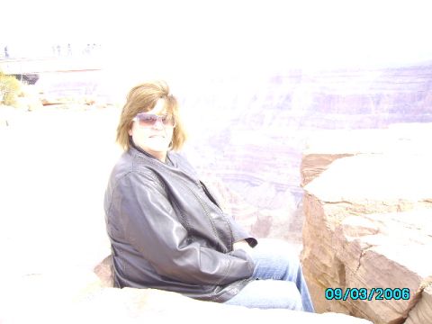 1978 Ford Bronco - A woman enjoys the view at the Grand Canyon, with a date stamp of 09/03/2006 visible.