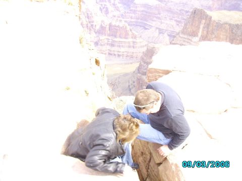 1978 Ford Bronco - Two individuals peer into a deep canyon from a rocky precipice, captured on September 3, 2006.