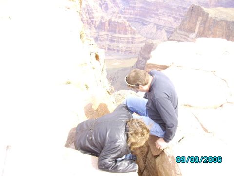 1978 Ford Bronco - Two individuals peer over the edge of a vast canyon, with a date stamp indicating the photo was taken on September 3, 2006.