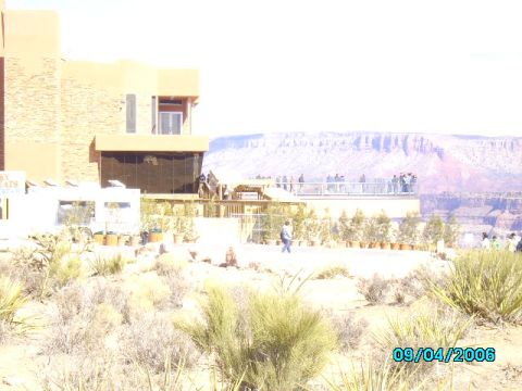 1978 Ford Bronco - A white RV is visible in the foreground, with a building and a scenic canyon overlook in the background. The date stamp reads 09/04/2006.