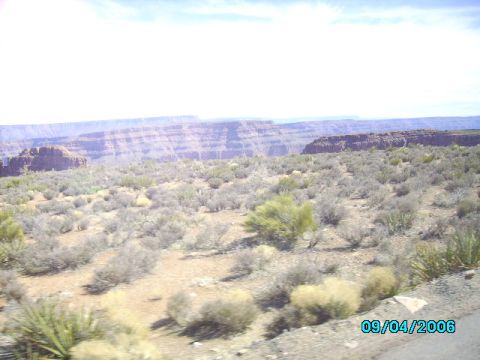 1978 Ford Bronco - A vast desert landscape with layered rock formations in the distance, captured on September 4, 2006.
