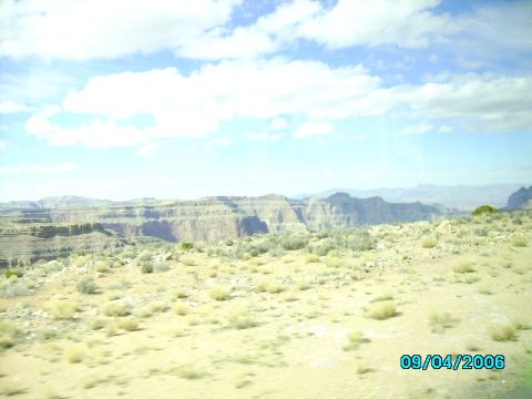 1978 Ford Bronco - Desert landscape with mesas and clouds. The date 09/04/2006 is visible.