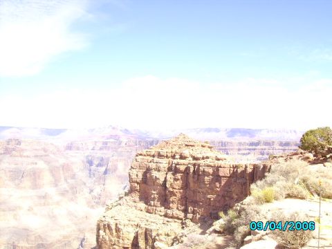 1978 Ford Bronco - A scenic view of the Grand Canyon, layered rock formations and sparse vegetation, captured on September 4, 2006.