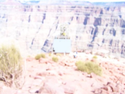 1978 Ford Bronco - A scenic overlook at the Grand Canyon with a viewing platform and distant cliffs.