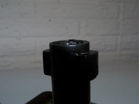 1995 Mercury Grand Marquis - Black metal component photographed against a light-colored, textured background.