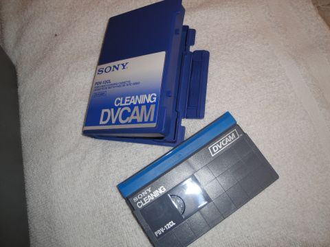 1993 Ford Taurus - A Sony DVCAM cleaning cassette is shown next to its protective case.