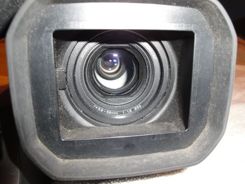 1993 Ford Taurus - The viewfinder of a camcorder shows the lens details and is covered in dust.
