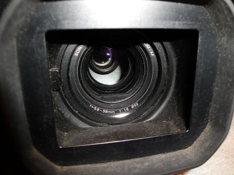 1993 Ford Taurus - Close-up of a camera viewfinder showing lens specifications and the Sony brand.