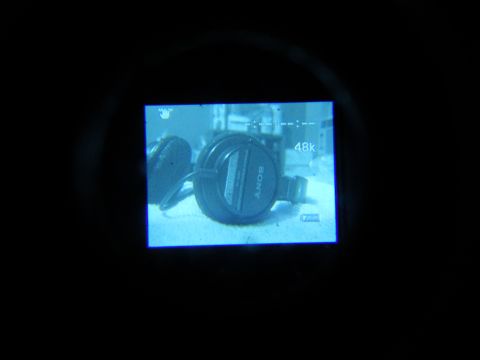 1993 Ford Taurus - Sony headphones are visible on a surface, with '48k' displayed on a screen.