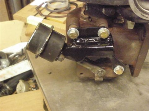 1994 Ford F-350 - Close-up of a turbocharger wastegate actuator and its mounting bracket.