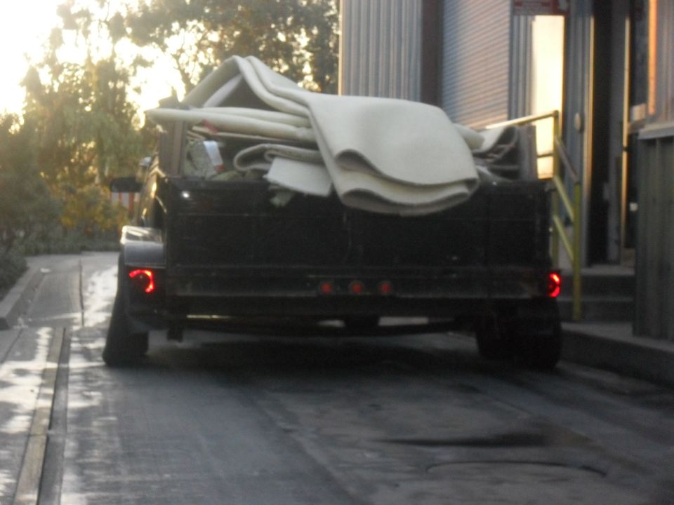 Bowed Axle Trailer at the dump