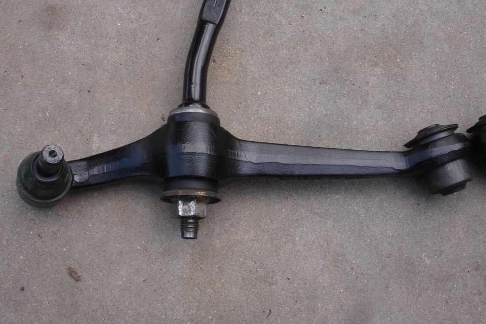 Front lower control arm with ball joint