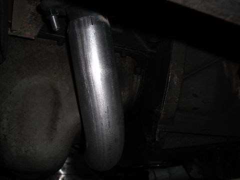 1991 Ford Bronco - Close-up view of a custom exhaust pipe section, showing its attachment points.